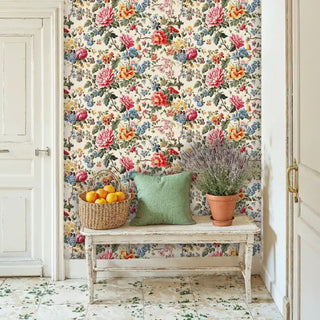 Vintage floral wallpaper featuring cottage garden blooms in rustic kitchen with white farmhouse bench
