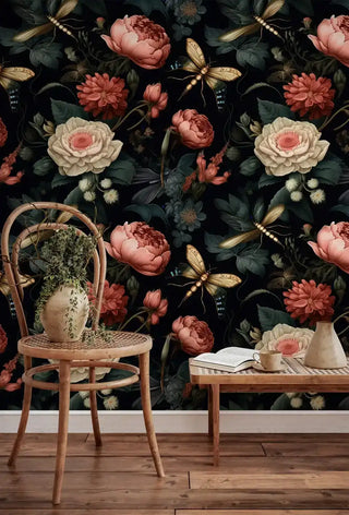 Vintage floral wallpaper with dramatic blooms and insects in a cozy reading nook with bentwood chair