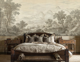 Vintage landscape wallpaper with mountains and trees in neutral tones, displayed behind antique wooden bed
