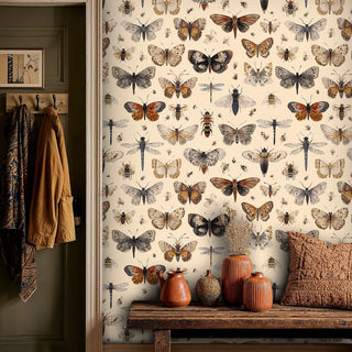 vintage naturalist wallpaper with butterflies and insects on cream background, styled in entryway with coat hooks
