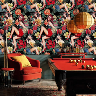 Vintage pin-up wallpaper featuring glamorous figures and tropical blooms in a luxurious game room with pool table