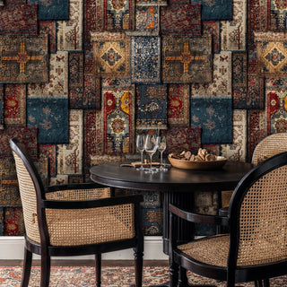 vintage rug patchwork wallpaper in warm tones, featured in dining room with round table and cane chairs