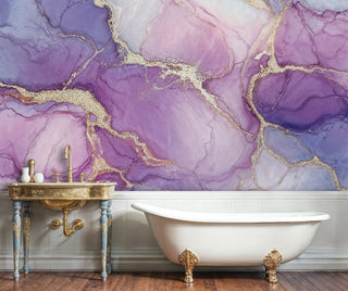 Violet alcohol ink wall mural with gold accents shown in a bathroom with freestanding clawfoot bathtub