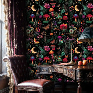 Whimsical butterfly mushroom wallpaper shown in classic study with leather chair and ornate wooden desk
