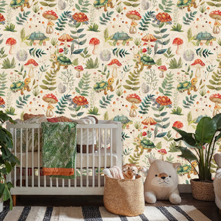 Whimsical forest wallpaper with turtles and botanicals on cream background, displayed in nursery with white crib