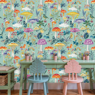 Whimsical mushroom wallpaper with colorful toadstools and woodland creatures, displayed in kids study with desk