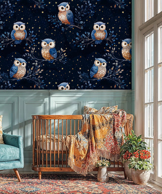 Whimsical owl wallpaper with starry night design, shown in elegant nursery with wooden crib and plants