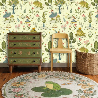 Whimsical princess frog wallpaper featuring botanical elements, displayed in child's room with vintage dresser