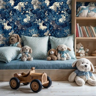 Woodland creatures wallpaper with detailed animals and florals, shown in kids room with toy shelf and stuffed animals