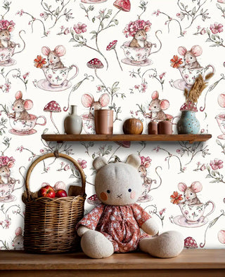 Woodland teacup mice wallpaper with pink florals and mushrooms, shown with plush bear and shelf